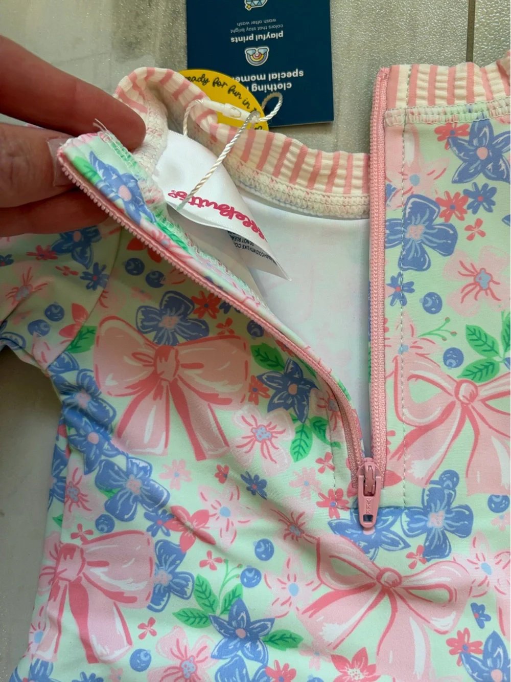 NWT RuffleButts Pastel Bow Blooms Long-Sleeve Rashguard Swimsuit Girls 3-6M